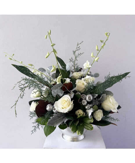 white flowers with silver bell accents
